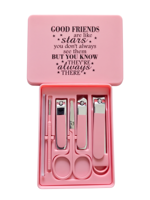 Pink nail care set in a matching plastic case with a printed quote on the lid, shown open on a white background.
